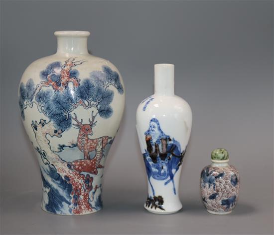An underglazed red 19th century Chinese vase and two others (3) Largest H.19cm